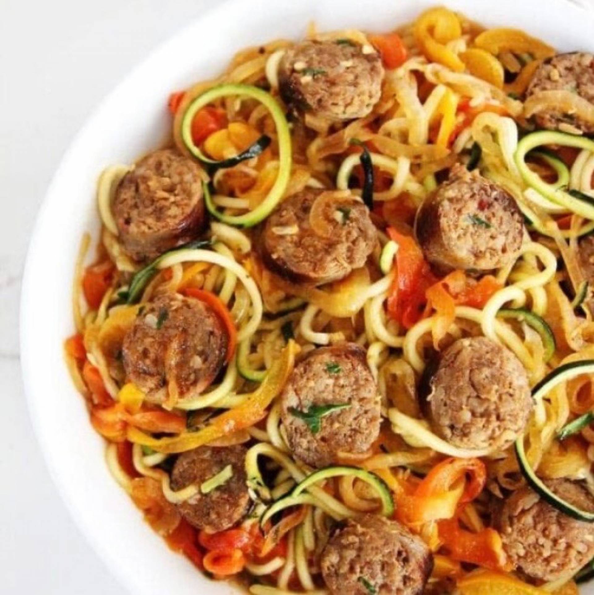 Vegan Sausage Peppers and Onions