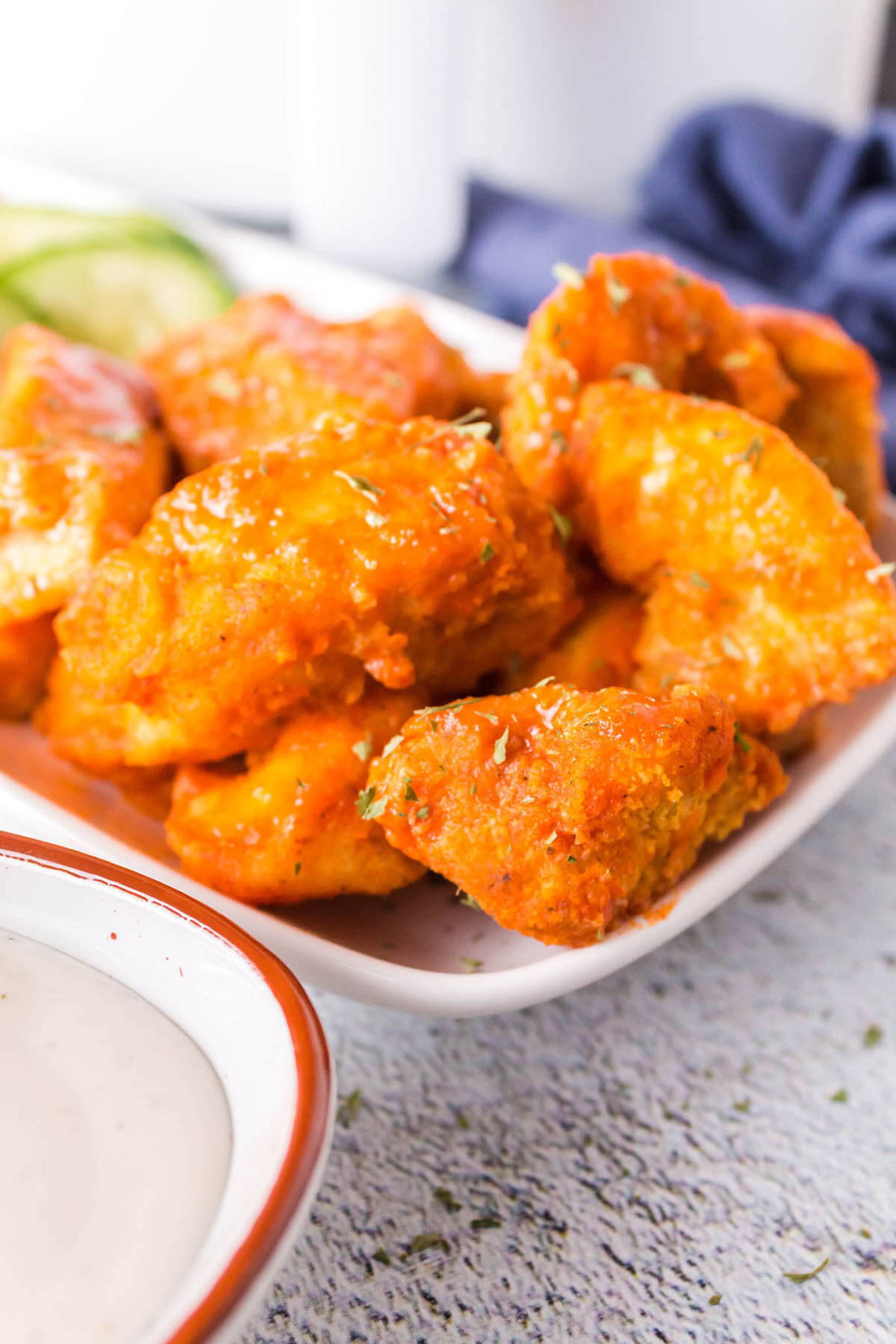 Buffalo Chicken Bites over Romaine Lettuce and Sweet Potato Fries (PRO)